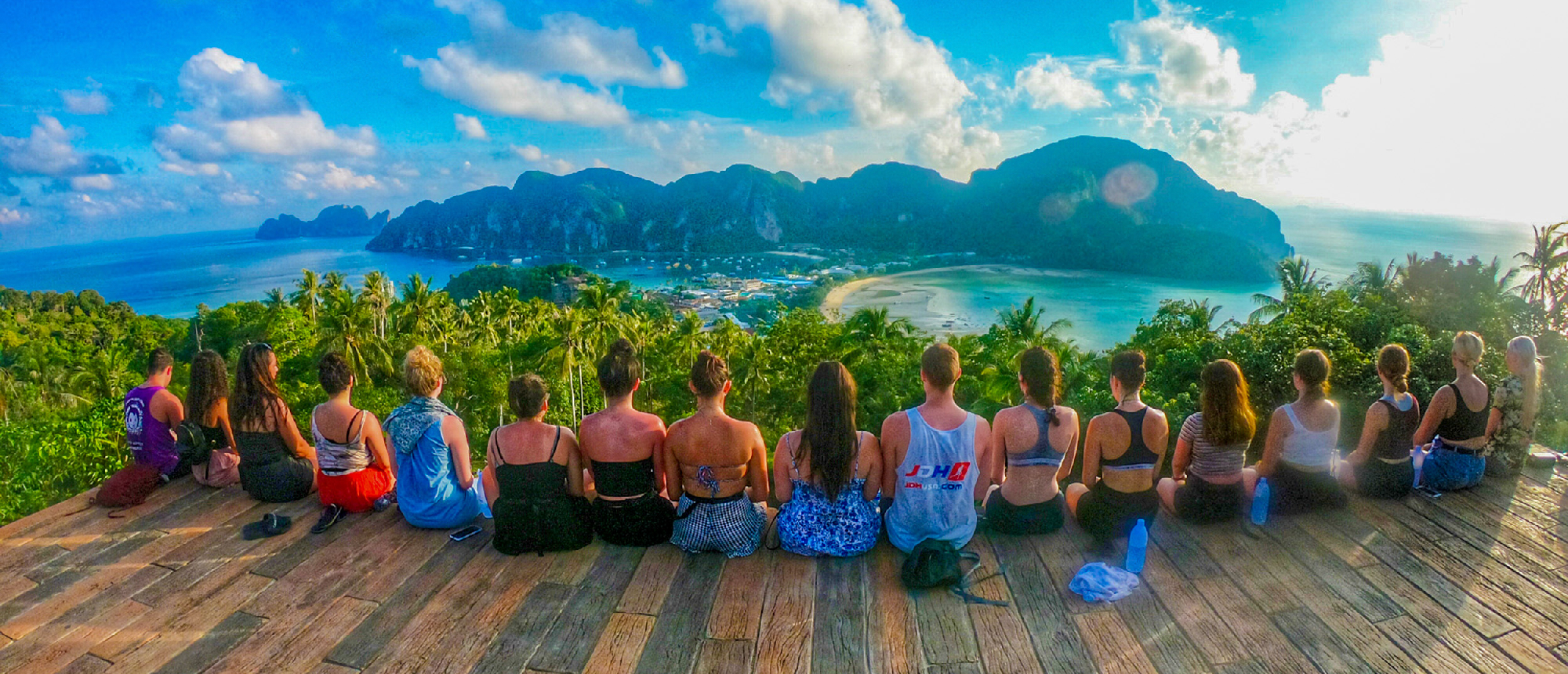 Panoramic view of turquoise lagoon and lush limestone cliffs from Koh Phi Don viewpoint