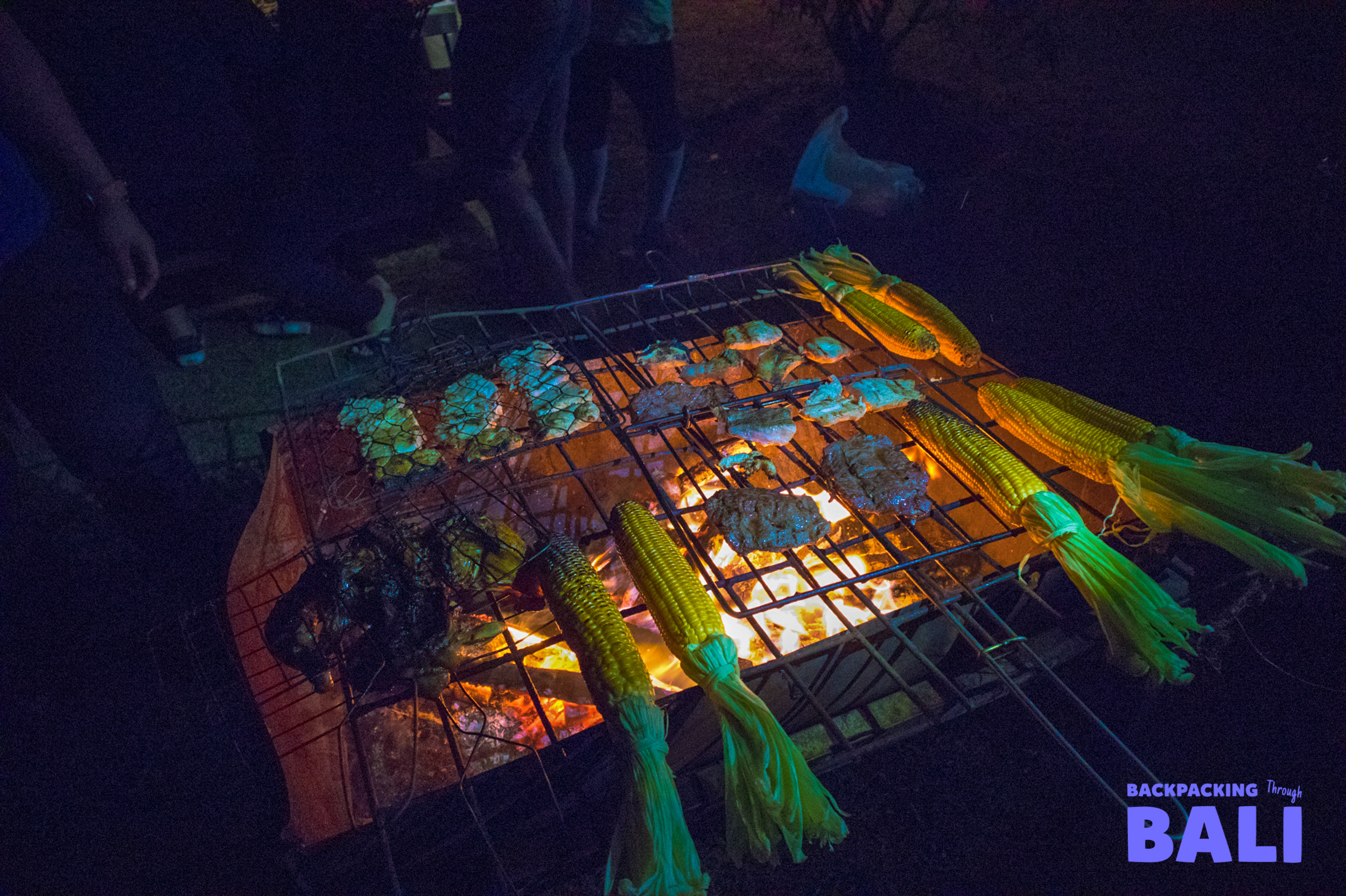 Market stalls glowing with lights at night