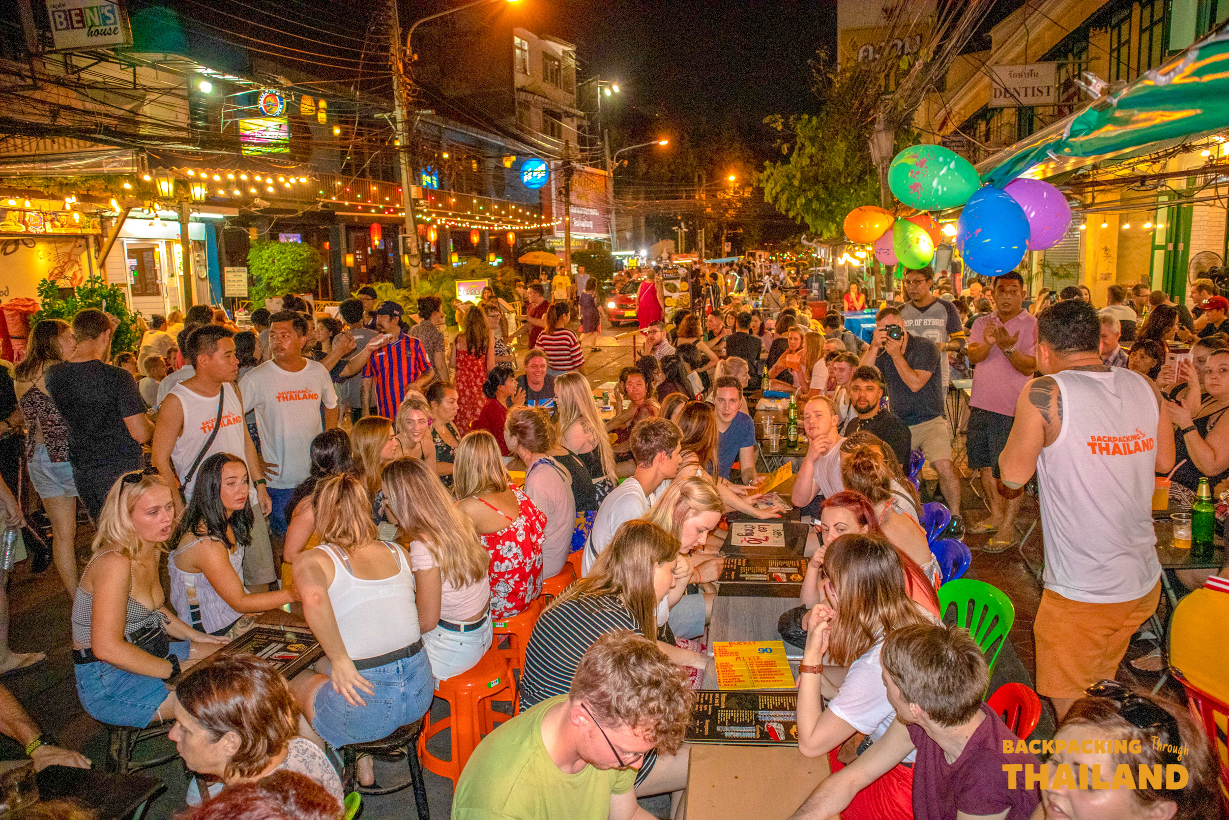 Backpackers and locals enjoy a vibrant night out on Bangkok's famous Khao San Road.
