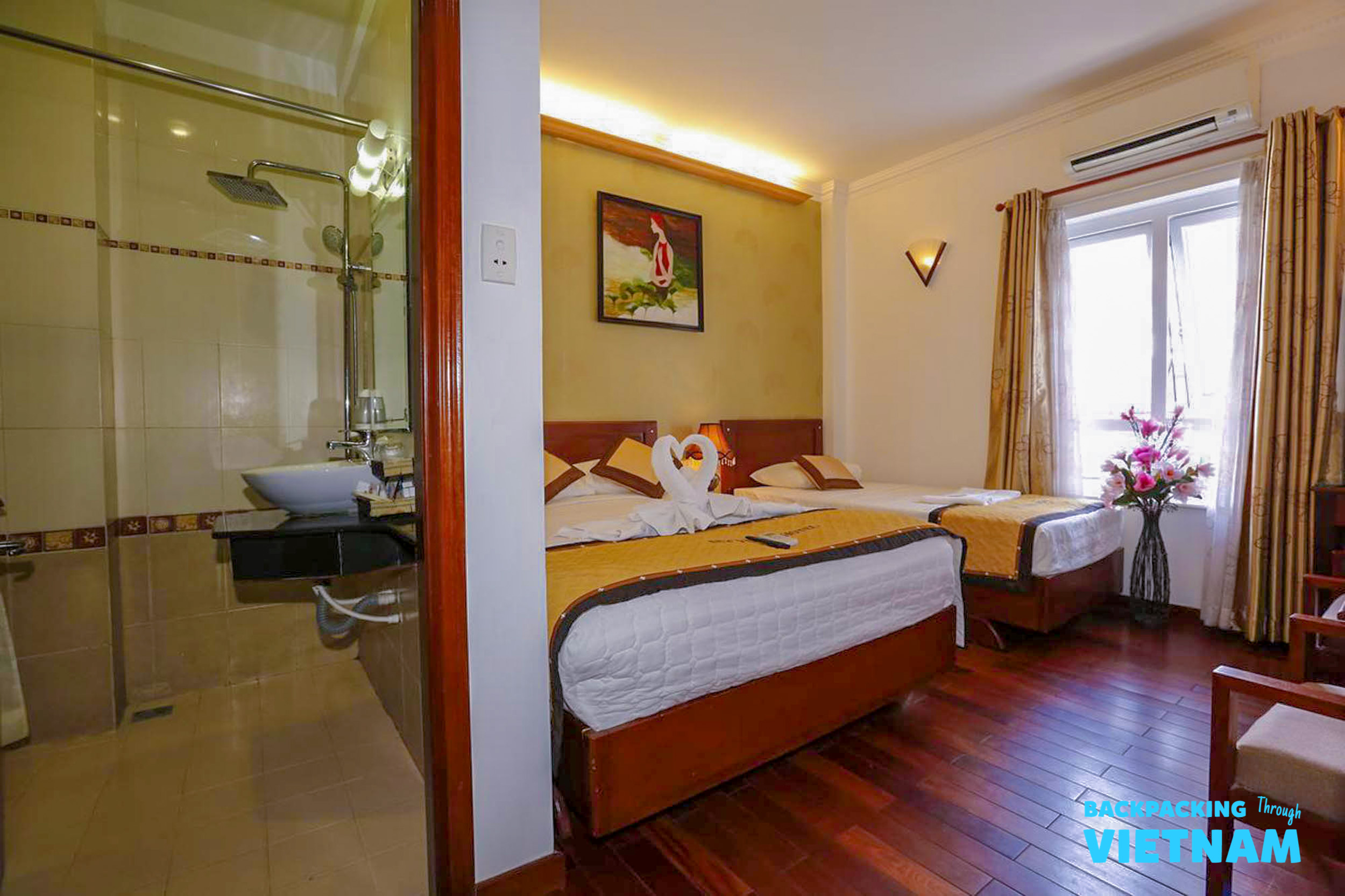 Spacious twin bedroom at Saigon hotel