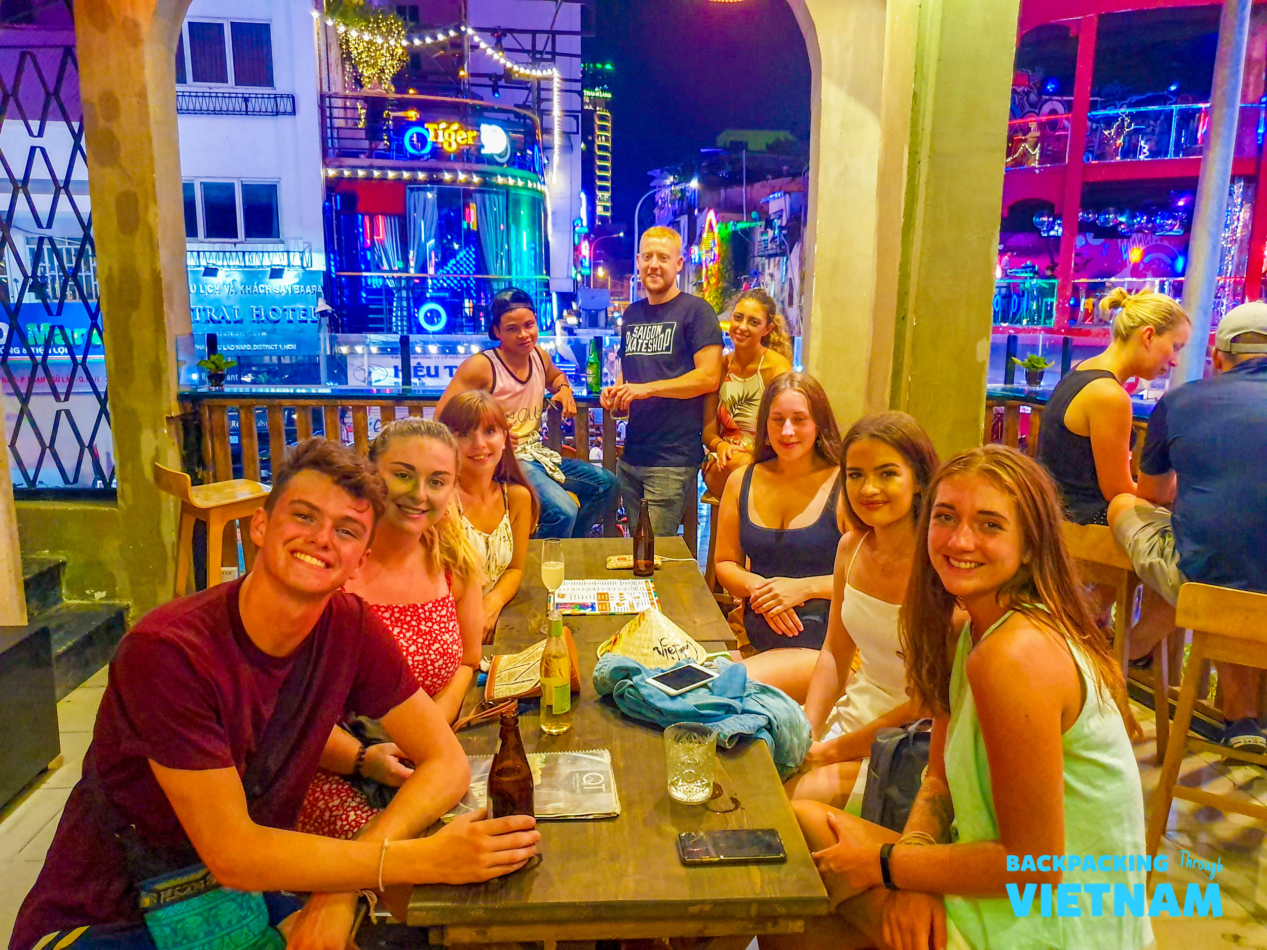 Backpacking group dinner at lively Saigon restaurant