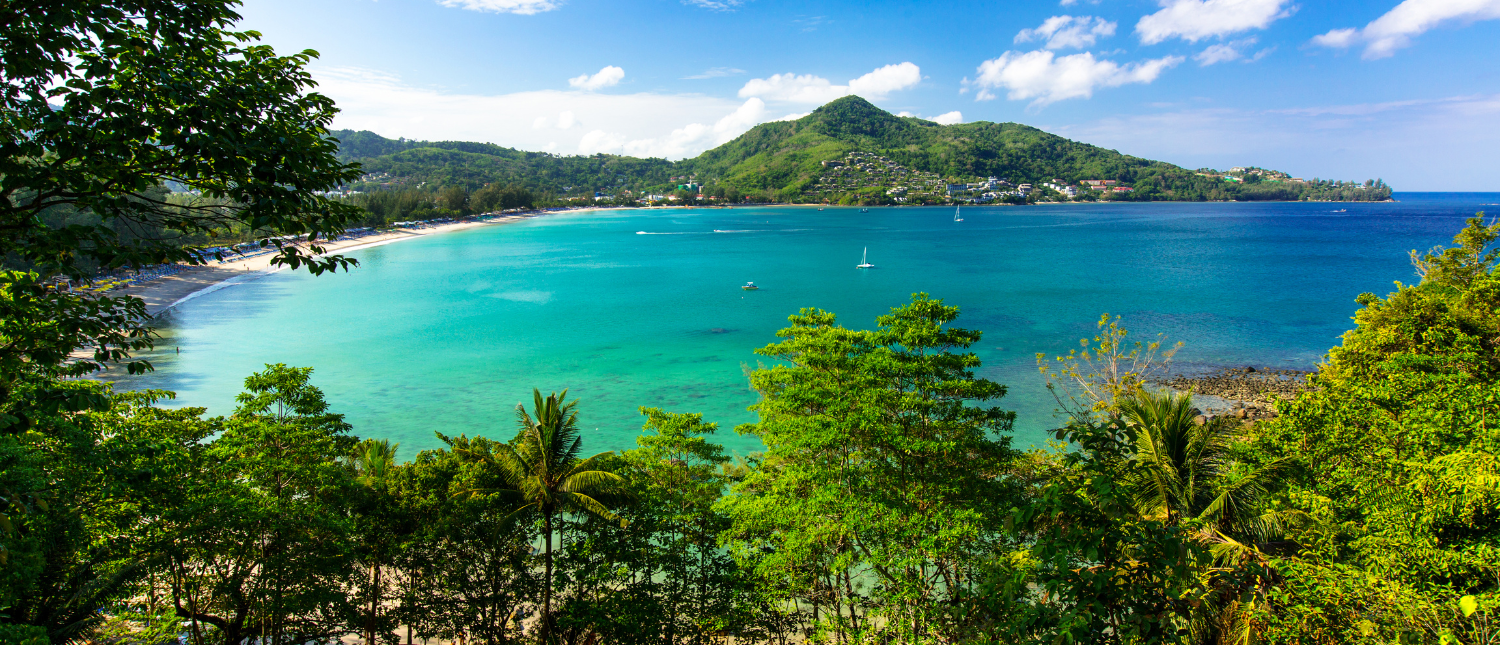Scenic view of turquoise waters and green islands from a viewpoint on Phuket island