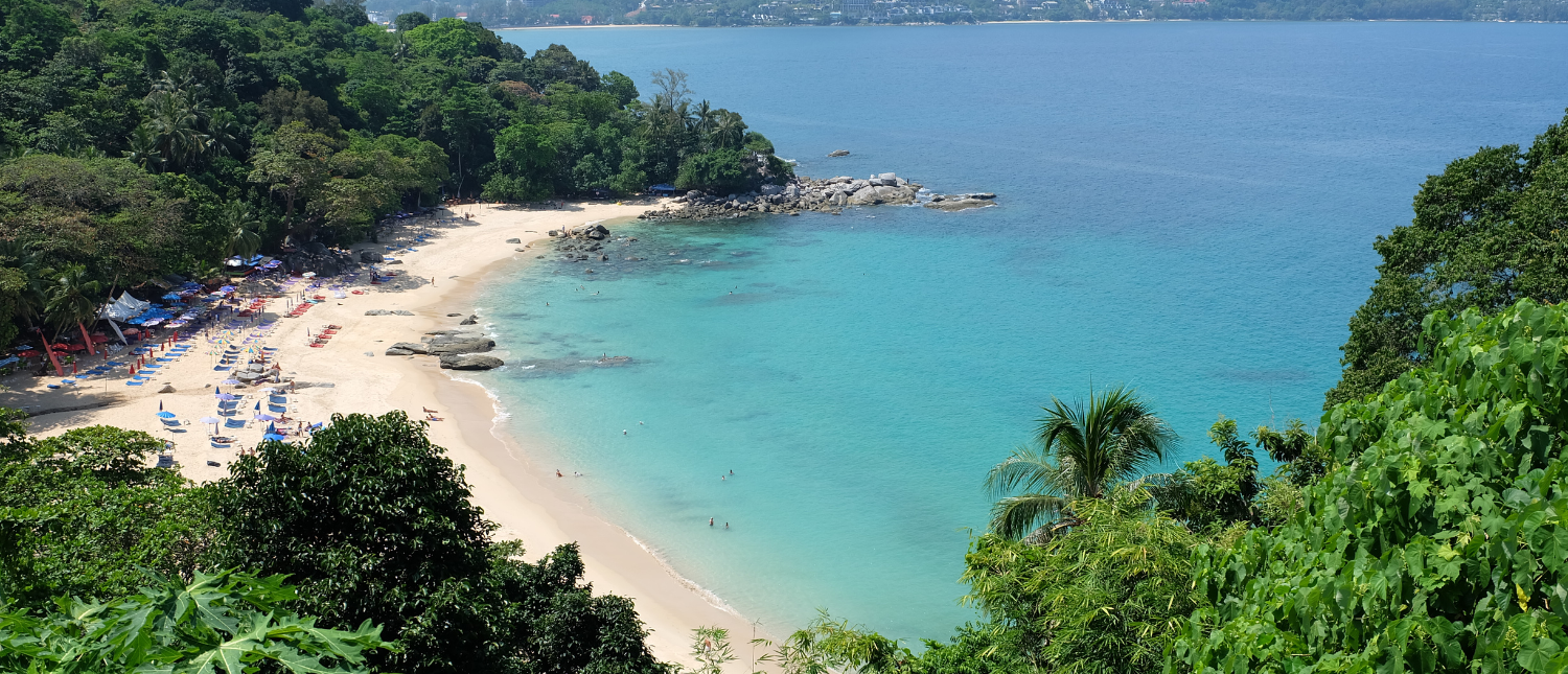 Scenic view of Phuket coast and turquoise sea at sunset during the backpacking tour
