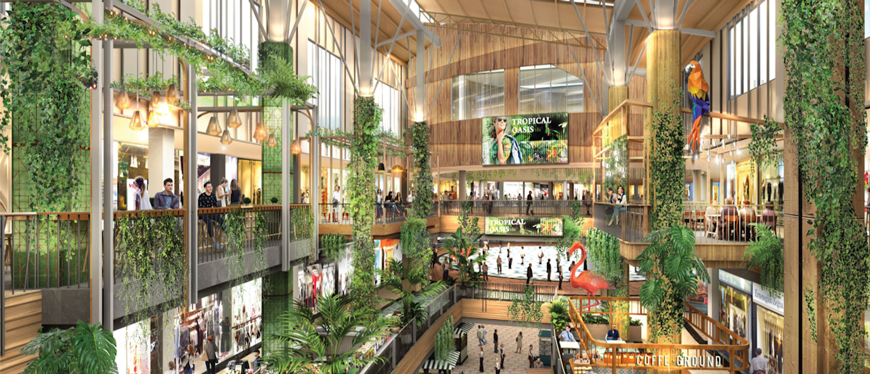 Modern shopping mall interior in Phuket with greenery and multiple levels