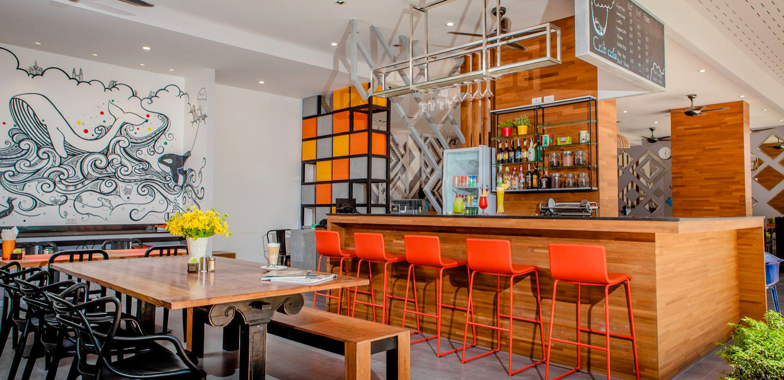 Trendy cafe and bar area at The Crib hotel in Phuket