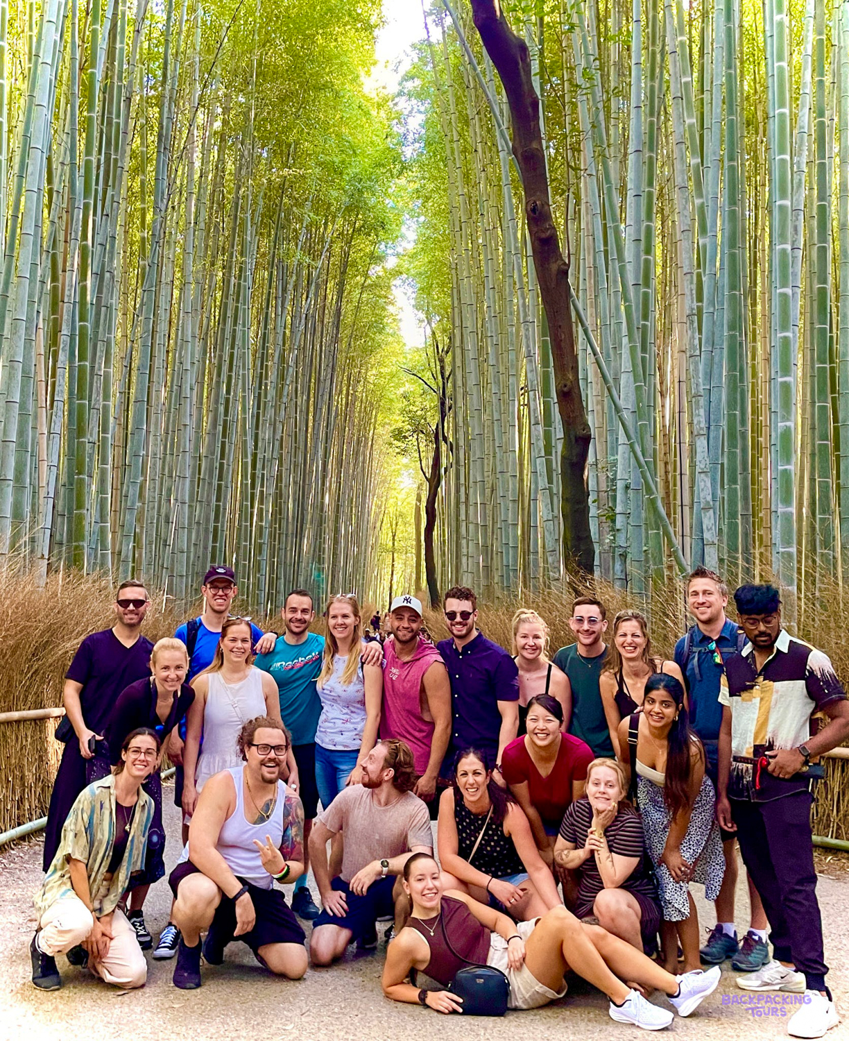 Travellers walking through the peaceful bamboo grove in Arashiyama, Kyoto.