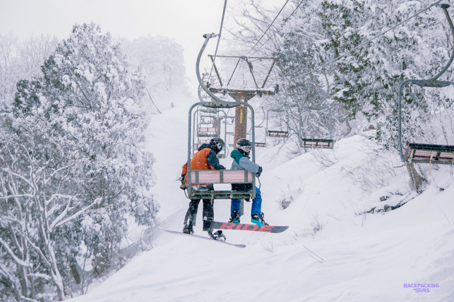 Skier on a snowy slope at Hakuba's Happo One ski resort