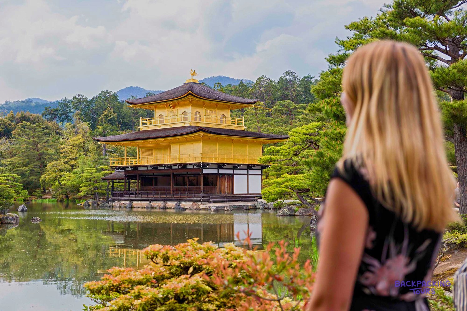 The gold-leaf Kinkaku-ji Golden Pavilion mirrored in its lake