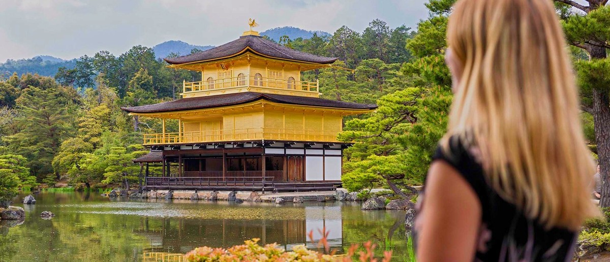 The gold-leaf Kinkaku-ji Golden Pavilion mirrored in its lake