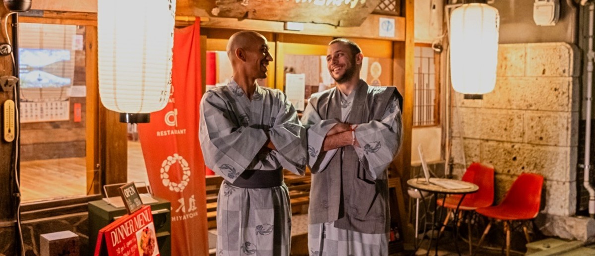 Travellers in yukata robes at a traditional Japanese inn in Nagano