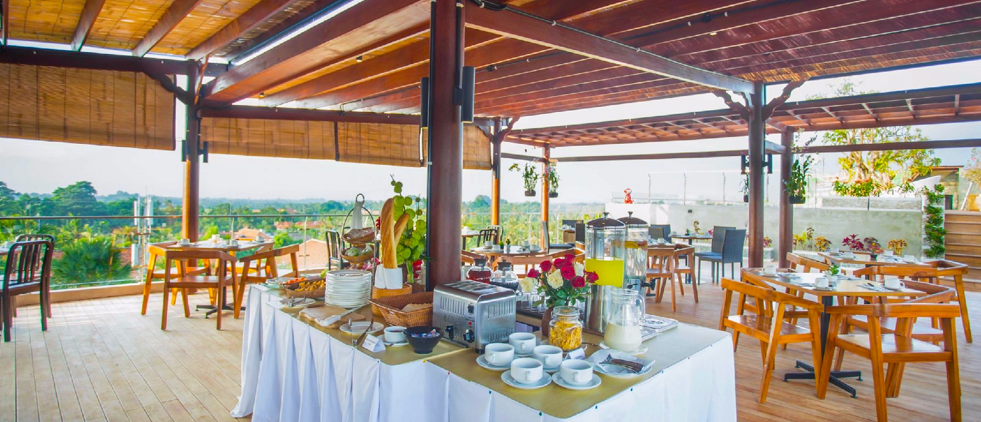 Open-air restaurant with wooden roof in Bali