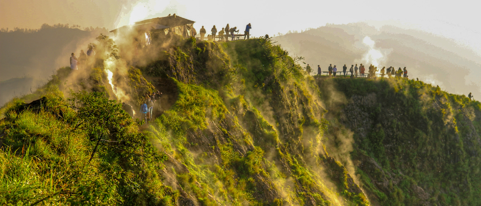 Sunrise view from ridge walkway overlooking valley in Ubud