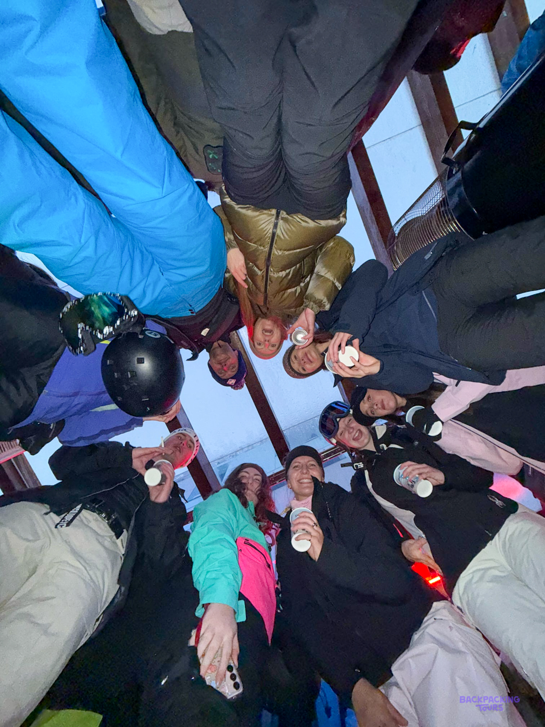 Group huddle in the ski lift heading up the Bansko slopes
