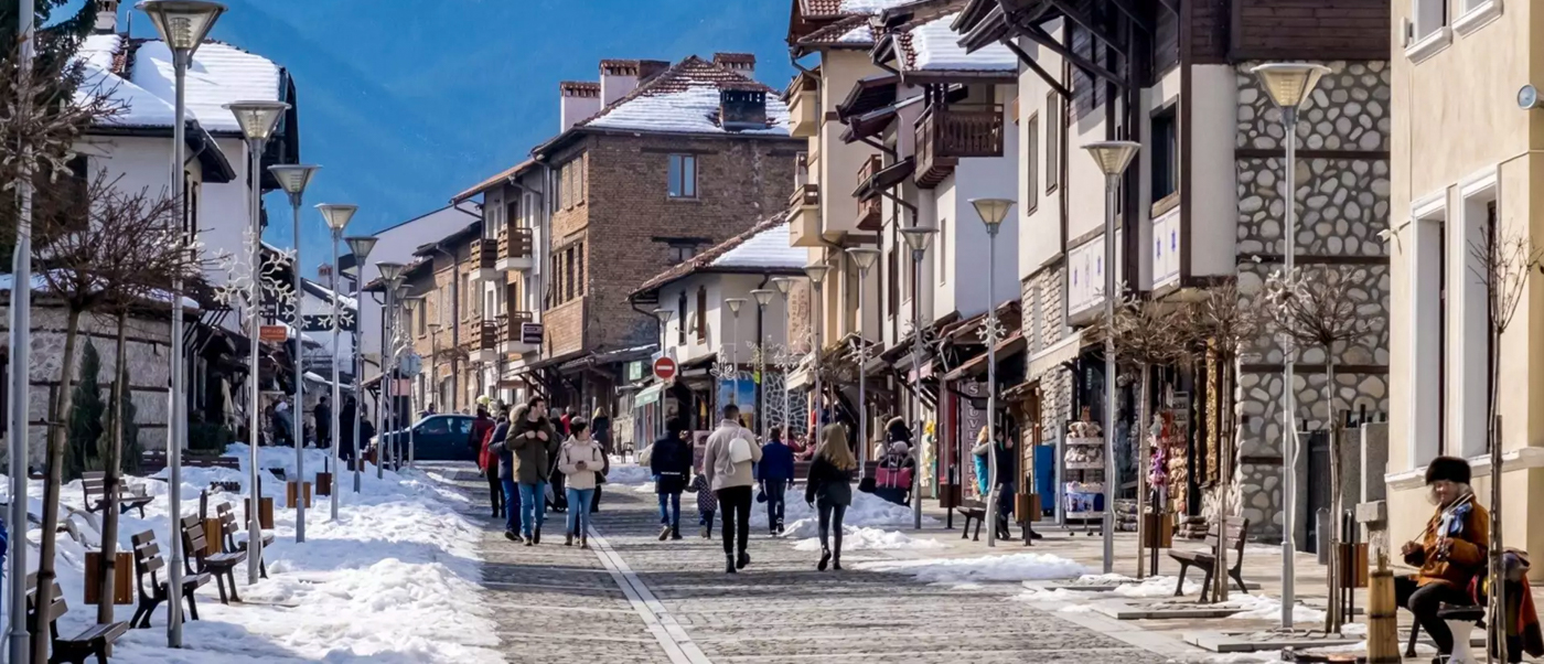 Snowy cobbled street welcoming travellers to Bulgaria on Day 1 of the ski trip