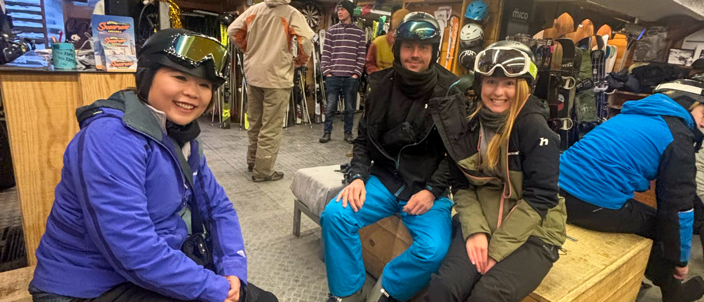 Group getting fitted for ski gear on arrival day in Bansko