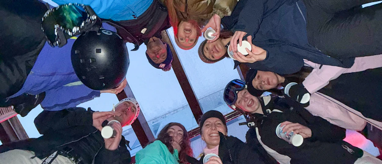 Group selfie having fun during the first ski day in Bansko