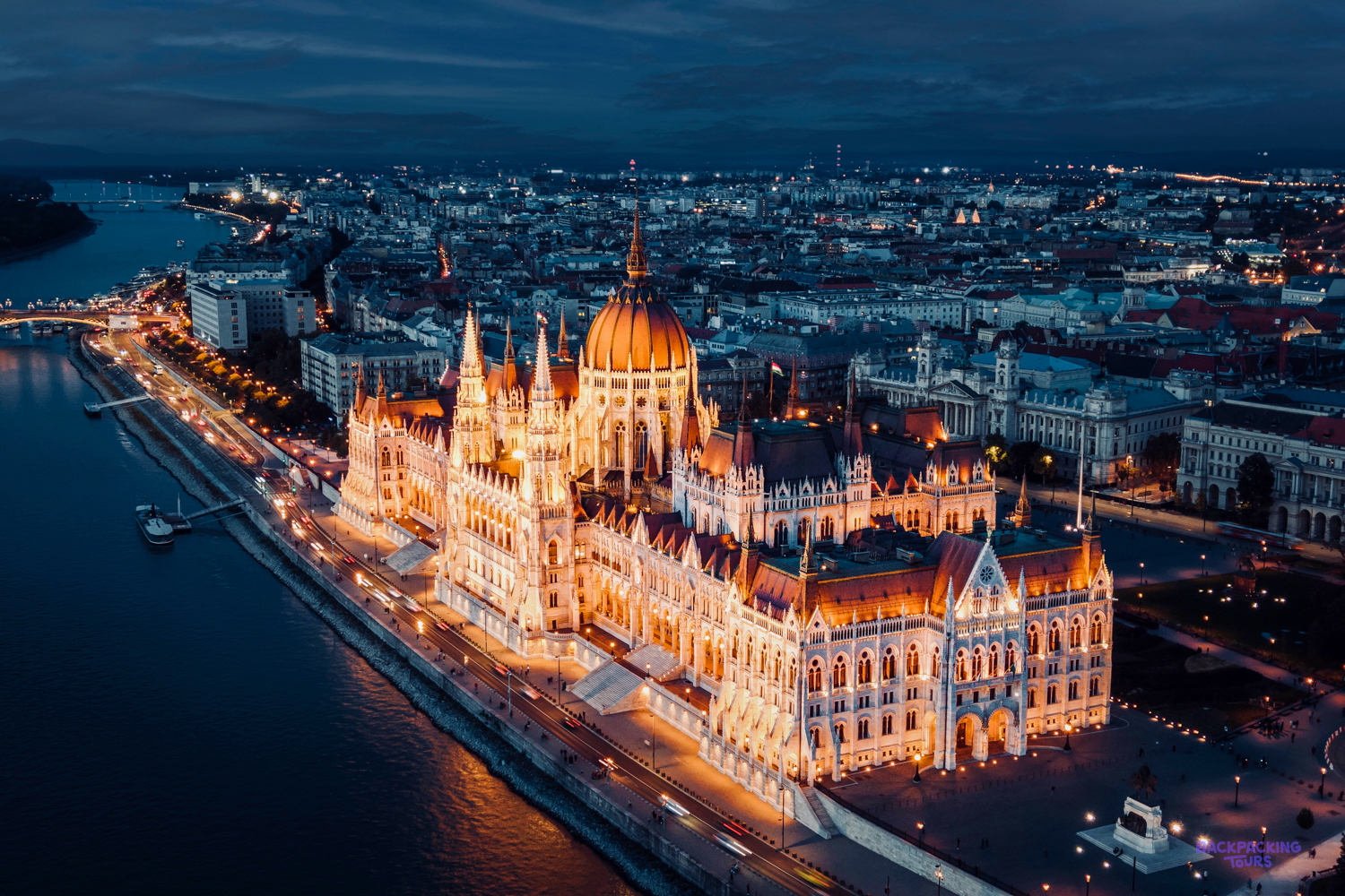 The Hungarian Parliament lit up at night on the banks of the Danube in Budapest.