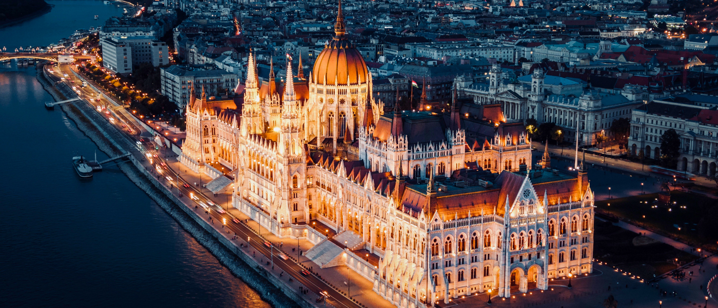The Hungarian Parliament lit up at night on the banks of the Danube in Budapest.