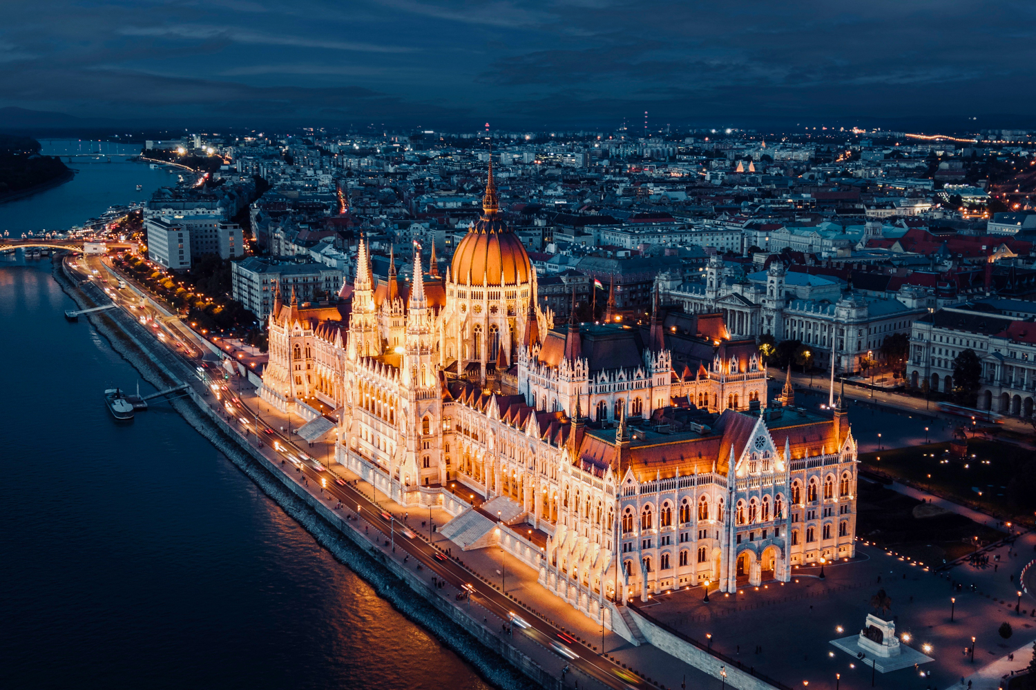 The Hungarian Parliament lit up at night on the banks of the Danube in Budapest.