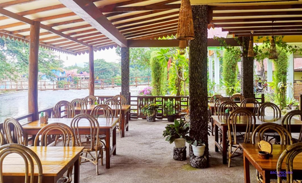 The riverside terrace restaurant of the guesthouse in Bukit Lawang