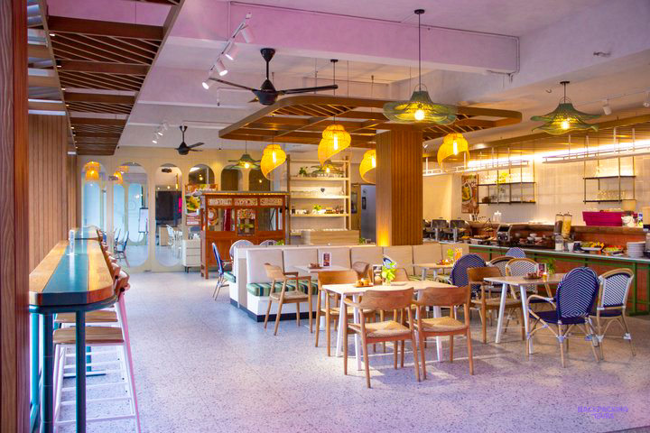 The bright café and lounge area of the hotel in Canggu