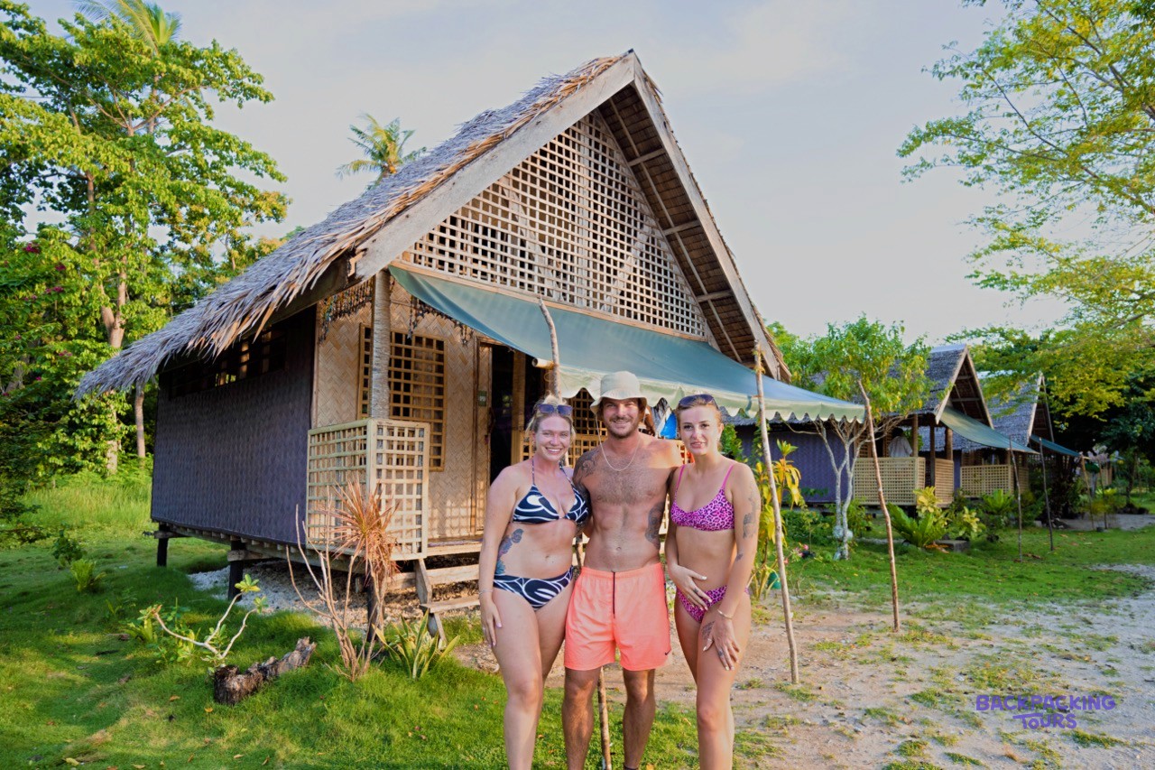 Simple twin share beach huts set back from the sand on the boat expedition.