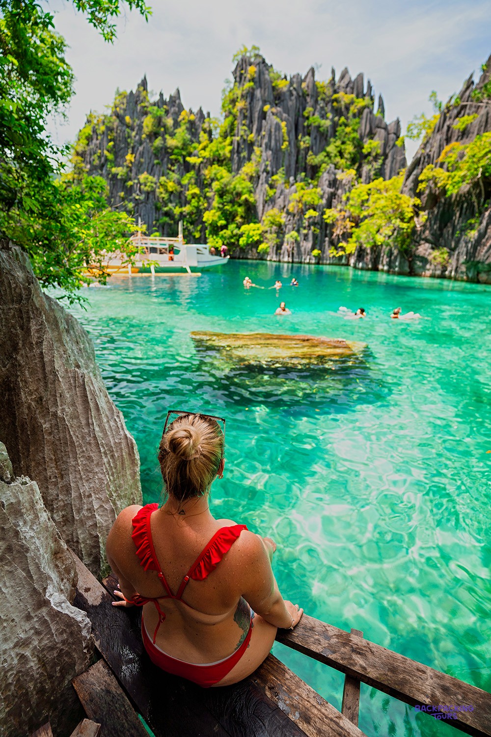 The dramatic limestone cliffs and emerald water of the Twin Lagoon in Coron.