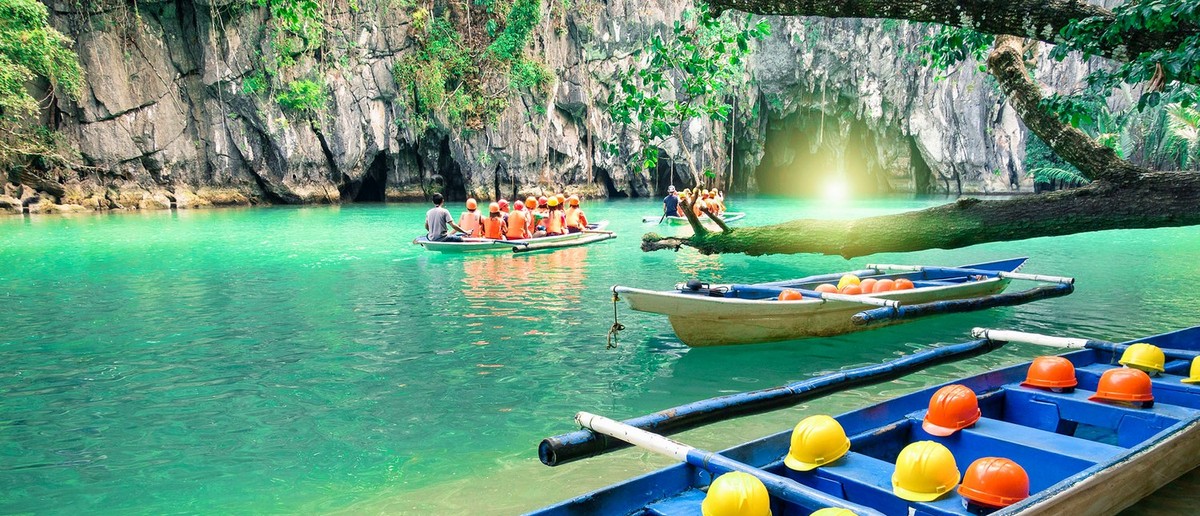 Stalactite formations lit up inside the Palawan Underground River.