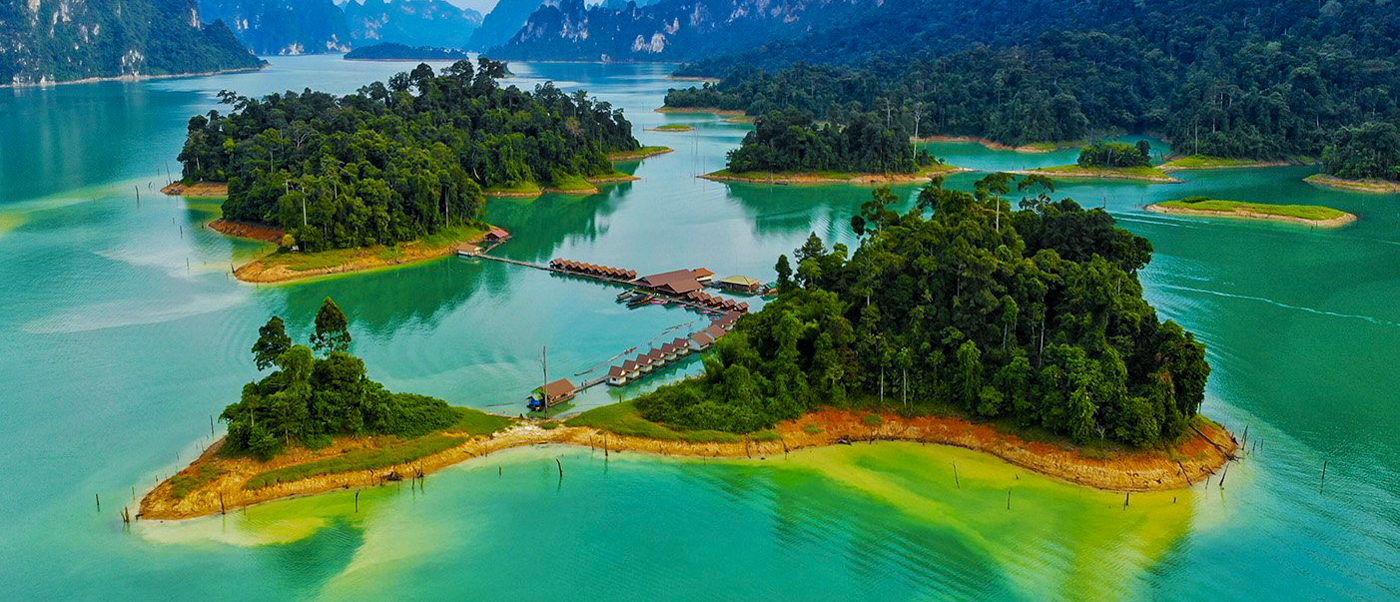 Kayaking across hidden lake to floating bungalows in Khao Sok National Park