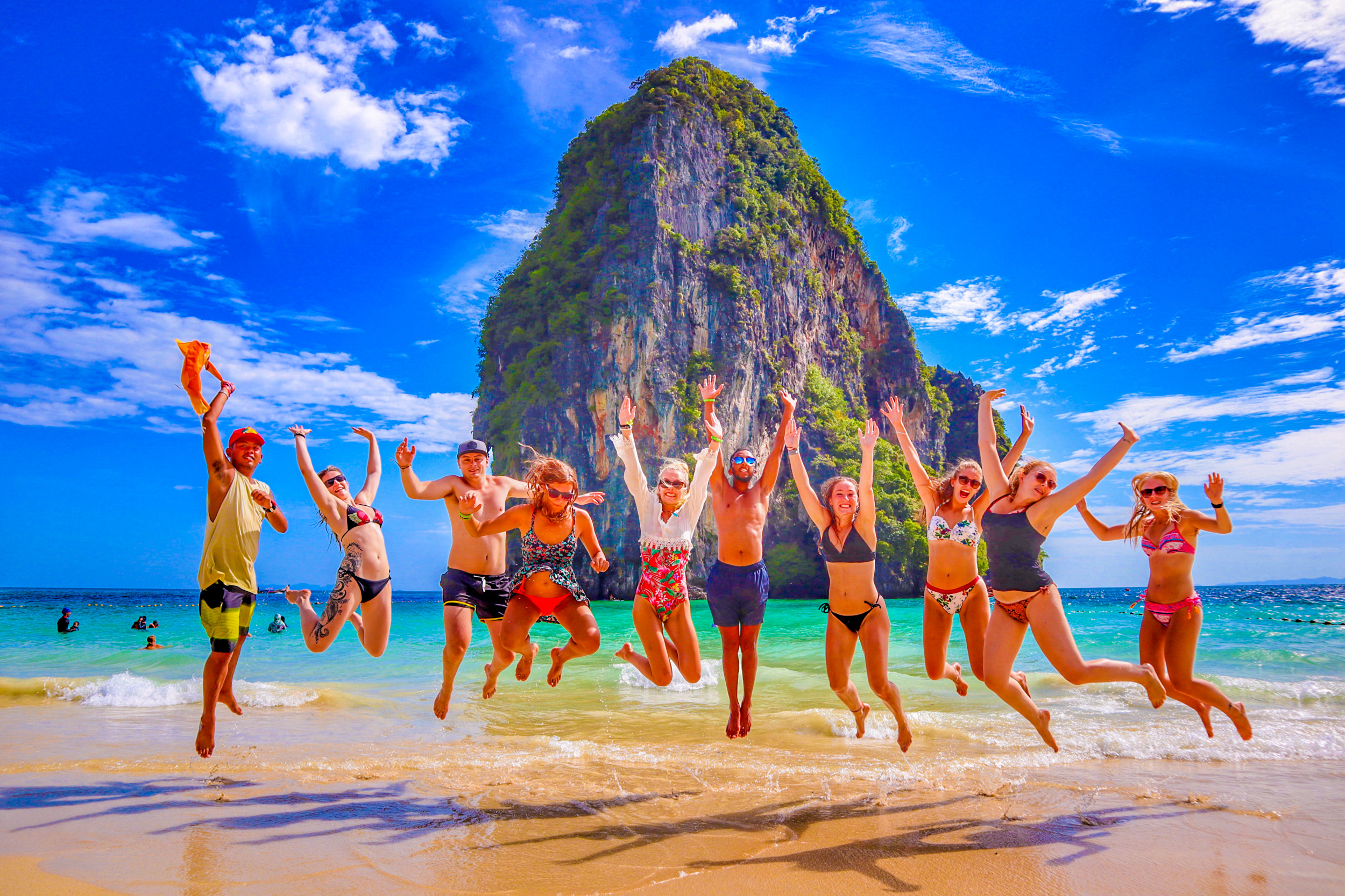 jumping group photo on railay beach, thailand